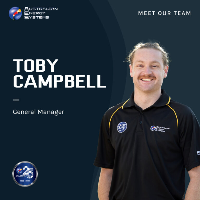A man, labeled as Toby Campbell, General Manager, stands smiling in a collared shirt with the Australian Energy Systems logo. The image highlights "MEET OUR TEAM" and includes the Australian Energy Systems logo, along with a "25 YEARS CELEBRATING 1998-2023" badge. | AES - Pool Heating & Energy Efficient Products